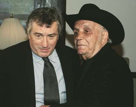 In this file photo taken on January 27, 2005, boxer Jake LaMotta and actor Robert De Niro (left) attend a special screening of Raging Bull to celebrate the iconic movieu2019s 25th anniversary and DVD release in New York. (AFP)