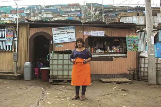 Ofelia Moreno, 51, runs a working class eatery where she prepares meals for about 125 people every day.