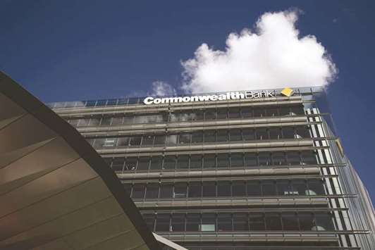 Signage for Commonwealth Bank of Australia is seen atop the Commonwealth Bank Place building in Sydney. The deal, which ranks among the top 10 insurance M&A in the Asia Pacific region excluding Japan, will see AIA acquiring CBAu2019s life insurance business in Australia and life and health insurance businesses in New Zealand.