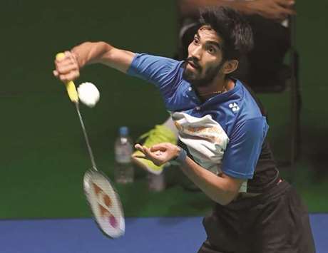 Indiau2019s Srikanth Kidambi hits a return against Hu Yun of Hong Kong during their menu2019s second round match at the Japan Open Badminton Championships in Tokyo yesterday. (AFP)