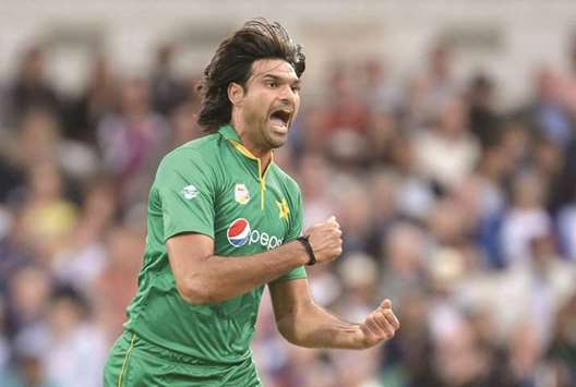 In this September 1, 2016, picture, Pakistanu2019s Mohamed Irfan celebrates taking his second wicket during the fourth ODI against England in Headingley. (AFP)