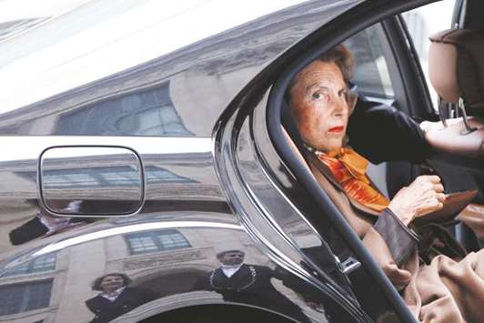 This file photo taken on October 12, 2011 shows Bettencourt arriving by car at the Institut de France in Paris.