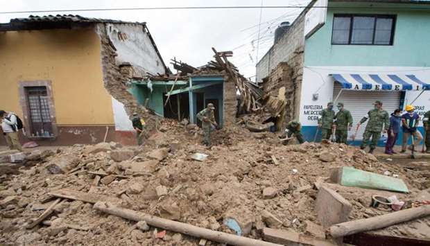 Damaged houses are seen in Joquicingo, Mexico on September 21, 2017 following a strong earthquake two days ago.