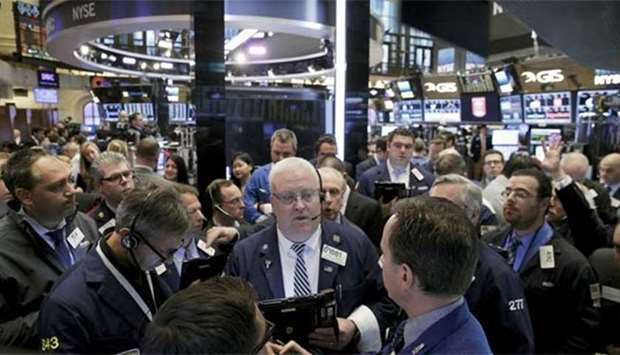 Traders work on the floor of the New York Stock Exchange. The S&P 500 rose 1.4% for the week and ended August with a gain of less than 0.1%, the smallest increase since March though still the ninth advance in 10 months.