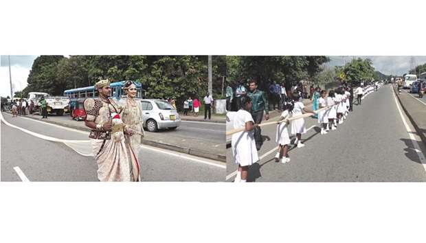 Wedding couple walk along a road as as a bride attempts to set a record for the longest wedding saree, with a length of 3.2km (2 miles), in the central district of Kandy yesterday. Right: Schoolchildren carry the wedding saree.