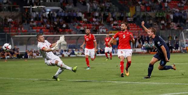 Englandu2019s Harry Kane (right) scores his teamu2019s fourth goal in the 2018 World Cup qualifying match against Malta in Tau2019 Qali, Malta, on Friday. (Reuters)