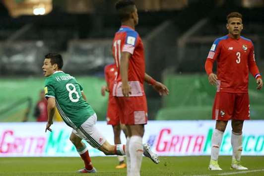 Left number 8: Mexicou2019s Hirving Lozano celebrates his goal against Panama in Mexico City on Friday. (Reuters)
