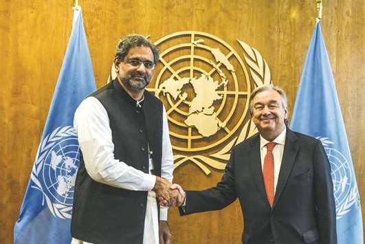 UN Secretary-General Antonio Guterres shakes hands with Pakistanu2019s Prime Minister Shahid Khaqan Abbasi at the 72nd United Nations General Assembly in New York City, US.