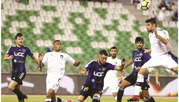 Action from the QNB Stars League match between Al Sadd (in white) and Al Sailiya (in blue and black) yesterday. PICTURE: Jayan Orma