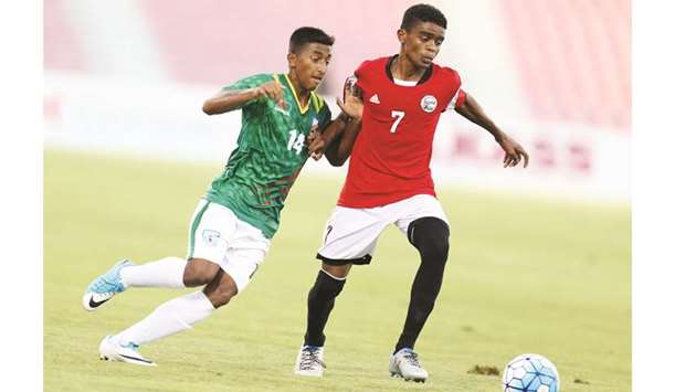 Yemen and Bangladesh players vie for the ball during the AFC U-16 qualifiers in Doha. PICTURE: Anas al-samaraee
