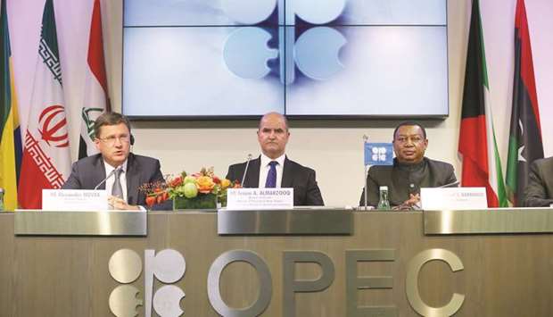 From left: Alexander Novak, Russiau2019s energy minister; Issam Almarzooq, Kuwaitu2019s oil minister; and Mohammed Barkindo, Opec secretary-general; attend a news conference at the Opec Secretariat in Vienna yesterday. As the Opec committee meeting wrapped up, Novak said the group and allied producers can wait until at least January to consider prolonging the output limits.