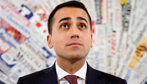 Stars movement Luigi Di Maio looks on as he arrives for a news conference in Rome, Italy, October 17, 2016