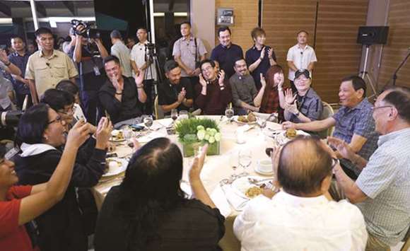 President Rodrigo Duterte hosts dinner for members of the press at the Matina Enclaves in Davao City.