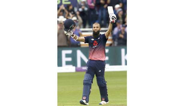 Englandu2019s Moeen Ali gestures after reaching his century during the third ODI against the West Indies at the Brightside Ground in Bristol yesterday. (AFP)