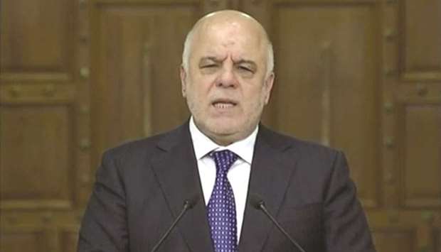 A still image taken from a video shows Iraqi Prime Minister Haider al-Abadi speaking as he makes a statement in Baghdad, yesterday.