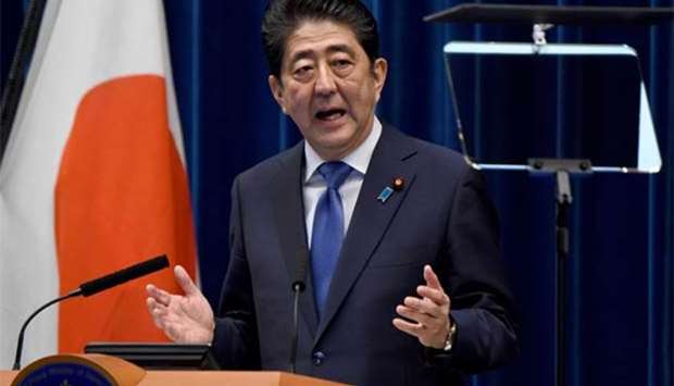Japan's Prime Minister Shinzo Abe gestures as he speaks during a press conference at his official residence in Tokyo on Monday.