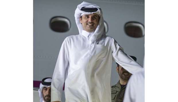 His Highness the Emir Sheikh Tamim bin Hamad al-Thani getting off the aircraft at Doha airport