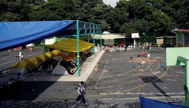 Tents are set up at a school turned shelter for people whose homes were damaged in an earthquake, in Mexico City