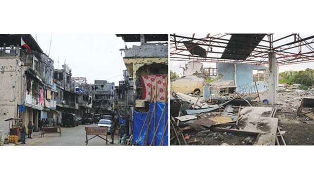 Government soldiers stand guard in front of damaged houses and buildings in Sultan Omar Dianalan boulevard at Mapandi district in Marawi city, southern Philippines. Right: A damaged building in seen in Sultan Omar Dianalan boulevard at Mapandi district.