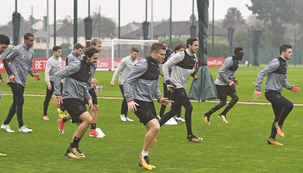 Liverpoolu2019s players train at the clubu2019s Melwood training complex in Liverpool, north west England, yesterday, on the eve of their Champions League Group E football match against Spartak Moscow in Russia. (AFP)