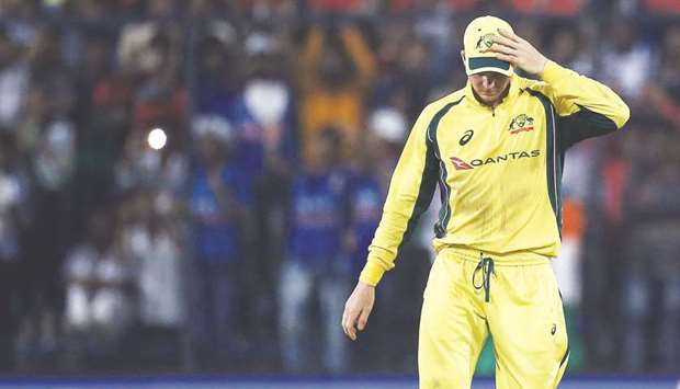Australiau2019s captain Steven Smith reacts after losing the third ODI game. (Reuters)