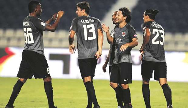 Al Rayyan players celebrate a goal during their QNB Stars League match against Al Kharaitiyat in Round 2.