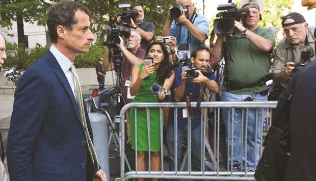 Weiner leaves the Federal Court in New York after being sentenced to 21-months in jail for sexting with a 15-year-old girl.