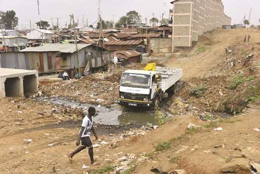A truck transports bricks for the construction of new homes for slum dwellers in the Kibera slum in Nairobi, Kenya on July 21, 2017. The UNDP once more mentioned Islamic finance and how it could be tapped as u201ca strong and scalable funding source for global development.u201d