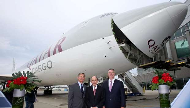 Qatar Airways Group Chief Executive Akbar al-Baker u00a9 with Boeing CEO Kevin McAlliste and Boeing vice chairman Ray Conner at the official delivery of Boeing 747-8F freighter to Qatar Airways in Seattle