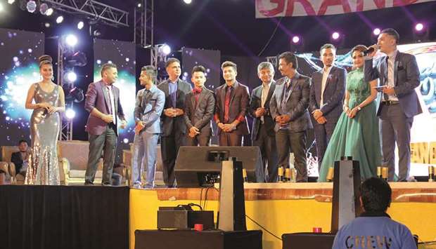 Judges along with the top three contestants during the announcement of the winner.