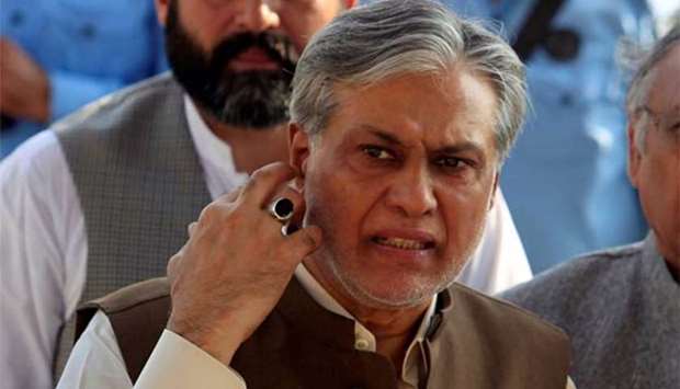 Pakistan's Finance Minister Ishaq Dar is seen after a party meeting in Islamabad.