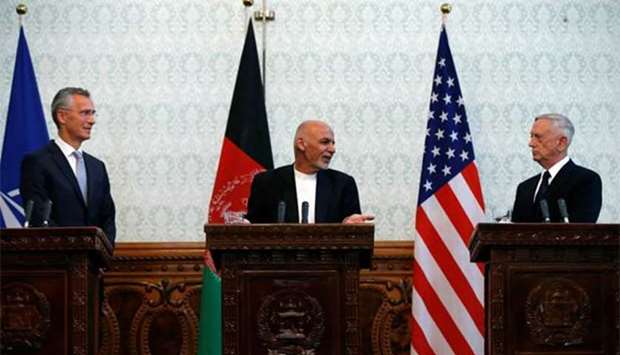 Afghanistan's President Ashraf Ghani is flanked by US Defense Secretary James Mattis (right) and Nato Secretary General Jens Stoltenberg at a news conference in Kabul on Wednesday.