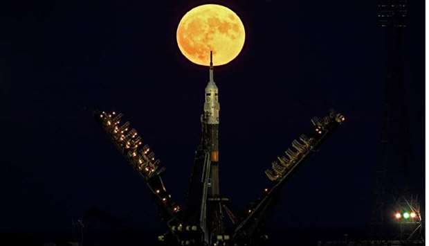 The supermoon behind the Soyuz MS-03 spacecraft set on the launch pad at the Russian-leased Baikonur cosmodrome in Kazakhstan. File photo:  November 14, 2016. AFP