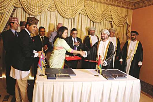 Ambassador of Nepal to Oman Sharmila Parajuli Dhakal (left) and Head of West Asia Department at the Ministry of Foreign Affairs of Oman, Hilah Marhoon al-Mammari exchange the MoU on behalf of the respective governments, in Muscat late on Wednesday