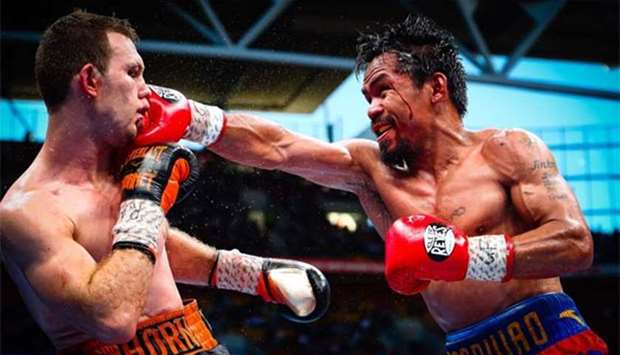 Manny Pacquiao (right) fighting Jeff Horn during their World Boxing Organisation bout in Brisbane on July 2 this year.