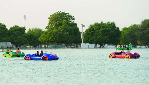 Children enjoying the boat ride at Aspire Park PICTURES: Noushad Thekkayil