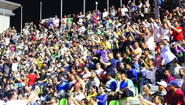 A capacity crowd enjoys an entertainment programme for the Nepalese community at Al Ahli Stadium.
