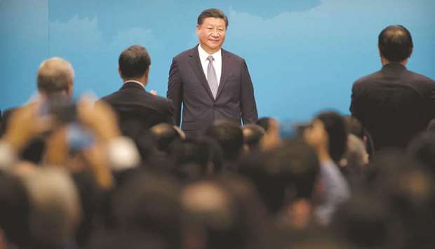 Chinese President Xi Jinping leaves the stage after speaking during the opening ceremony of the Brics Business Forum at the Xiamen International Conference and Exhibition Center in Xiamen, China.