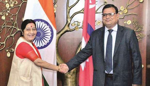 Nepalu2019s Deputy Prime Minister Krishna Bahadur Mahara shaking hands with Indiau2019s External Affairs Minister Sushma Swaraj during a visit to New Delhi recently.