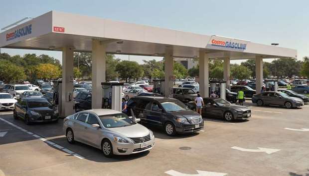 Motorist line-up for gasoline at a Costco gas station in the aftermath of Hurricane Harvey in Texas