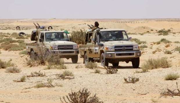 Libya forces allied with the UN-backed government patrol to prevent Islamic State resurgence on the outskirts of Sirte, Libya, August 4, 2017