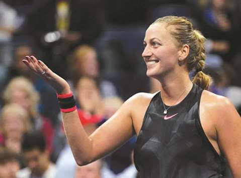Petra Kvitova of the Czech Republic reacts after she defeated Garbine Muguruza of Spain during their fourth round US Open match. (Reuters)