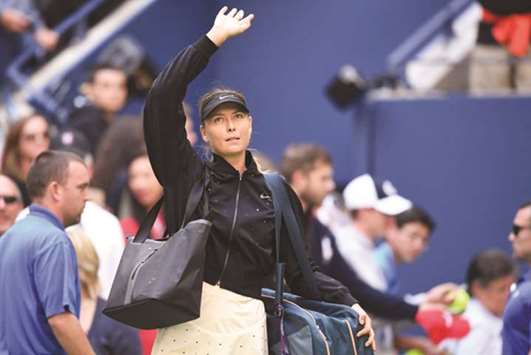 Russiau2019s Maria Sharapova leaves the court after loosing to Latviau2019s Anastasija Sevastova at the 2017 US Open in New York. (AFP)
