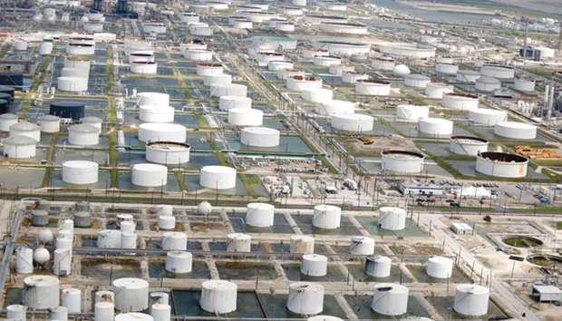 Oil refinery storage tanks are seen in this aerial photograph taken above Texas City. The rally in gasoline futures began to fizzle as domestic refiners bailed out swamped plants and resumed operations, while European and Asian traders swooped in with cargoes to capture profits.