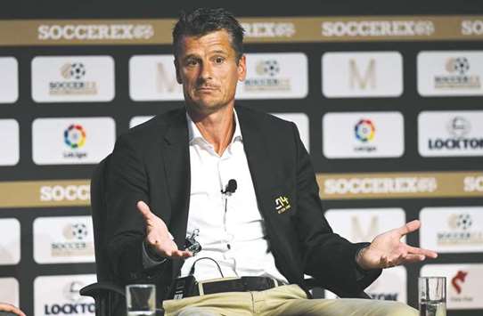 Former Dutch footballer and co-manager of Cruyff Football, Wim Jonk speaks during a panel discussion at the Soccerex Global Convention in Manchester yesterday. (AFP)