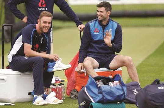 England seamers James Anderson (right) and Stuart Broad share a joke during the nets session at the Lordu2019s cricket stadium in London yesterday. (Reuters)