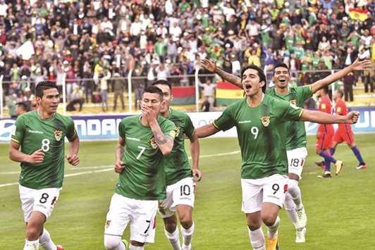 Boliviau2019s Juan Carlos Arce celebrates his goal against Chile on Tuesday. (AFP)
