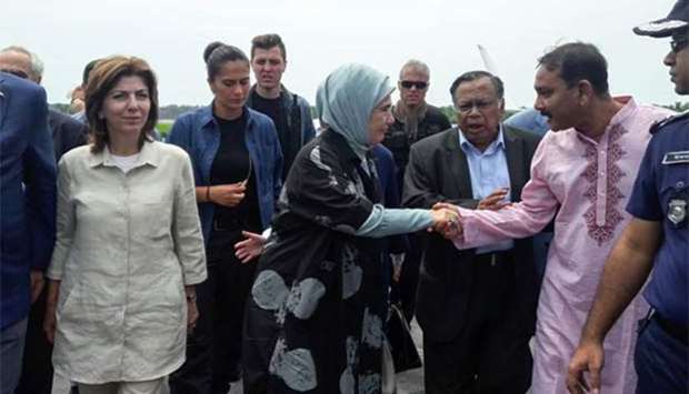 Turkey's First Lady Emine Erdogan (centre) arrives at Cox's Bazar airport on Thursday during a visit to meet with Rohingya Muslims who have fled from Myanmar.
