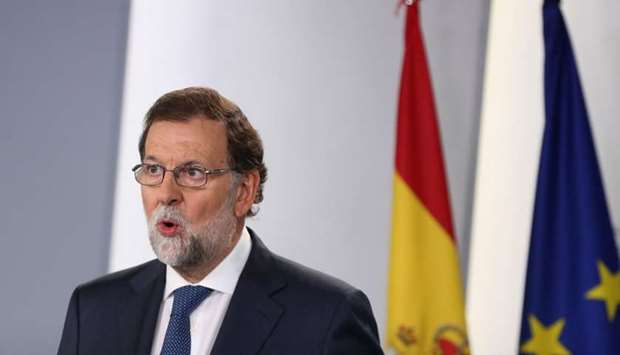 Spain's Prime Minister Mariano Rajoy makes a statement at the Moncloa Palace in Madrid