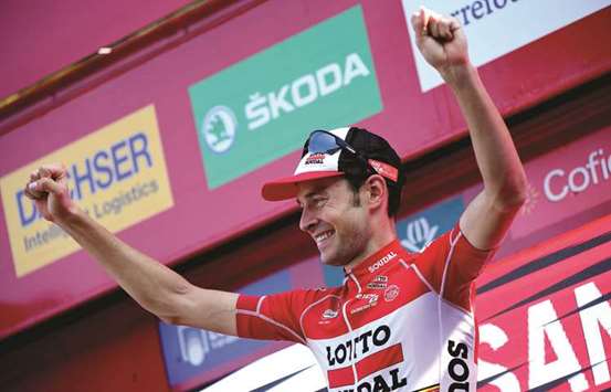 Lotto Soudalu2019s Belgian cyclist Sander Armee celebrates on the podium after winning the 18th stage of the 72nd edition of u2018La Vueltau2019 Tour of Spain cycling race, a 169km route from Suances to Santo Toribio de Liebana, near Potes, yesterday. (AFP)